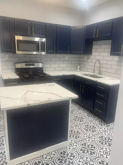 Kitchen - 48 E 154th St, Harvey, IL 60426 photo 1 of 3