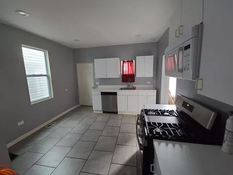 Kitchen - 7417 S Saint Lawrence Ave, Chicago, IL 60619 photo 1 of 1