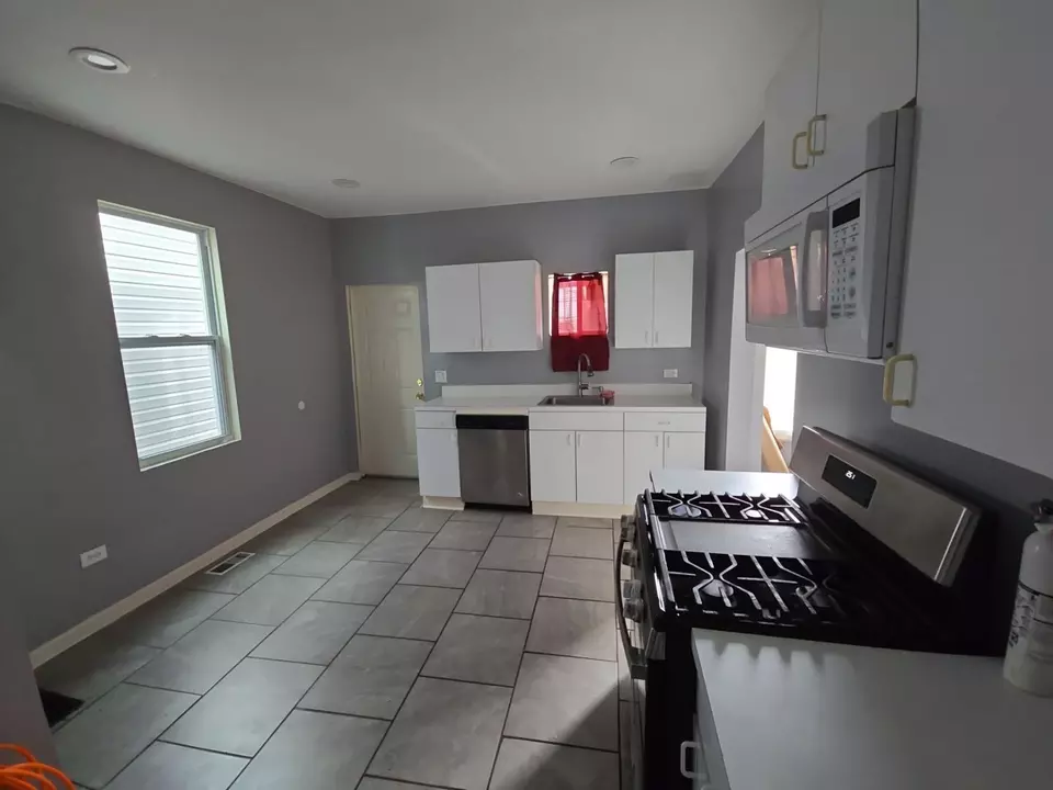 Kitchen - 7417 S Saint Lawrence Ave, Chicago, IL 60619 photo 1 of 1