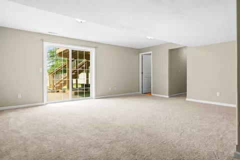 Living - 1312 Wicklow Dr, Bloomington, IL 61705 photo 9 of 11