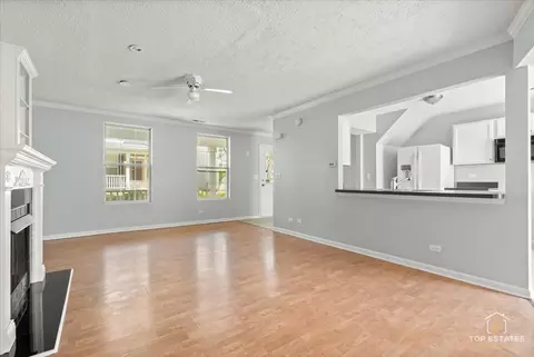 Living - 991 Symphony Dr, Aurora, IL 60504 photo 3 of 6