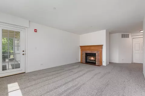 Living - 1608 Newburn Ct #D1, Wheeling, IL 60090 photo 1 of 3