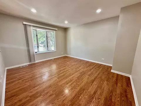 Living - 899 Carl Ave, Elgin, IL 60120 photo 1 of 2