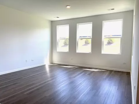 Living - 1255 Wild Tulip Ct, Bartlett, IL 60103 photo 2 of 2