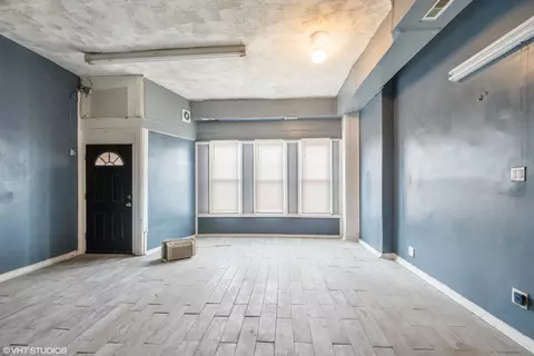 Living - 32 E 119th St, Chicago, IL 60628 photo 4 of 5