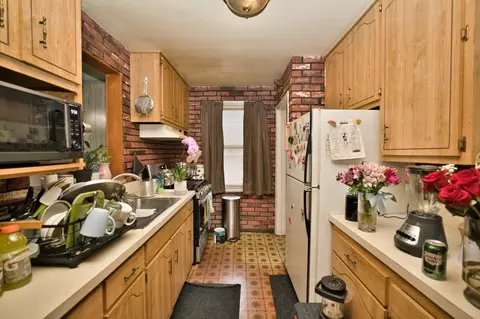 Kitchen - 551 E 149 St, Harvey, IL 60426 photo 1 of 3