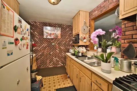 Kitchen - 551 E 149 St, Harvey, IL 60426 photo 2 of 3