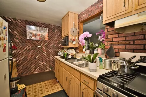 Kitchen - 551 E 149 St, Harvey, IL 60426 photo 3 of 3