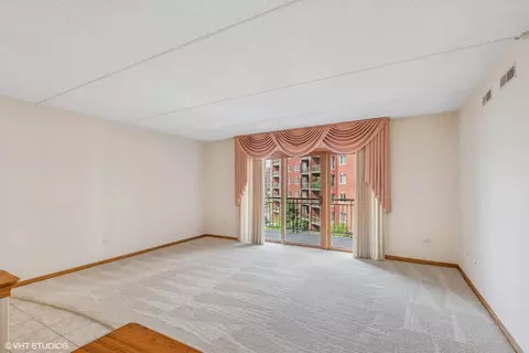 Living - 650 S River Rd #504, Des Plaines, IL 60016 photo 1 of 2