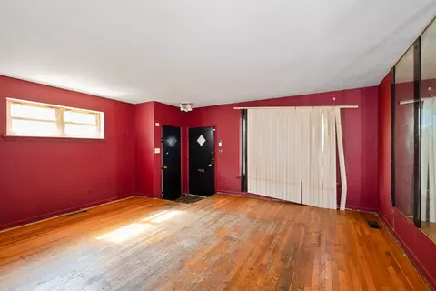 Living - 513 E 87th St, Chicago, IL 60619 photo 2 of 3