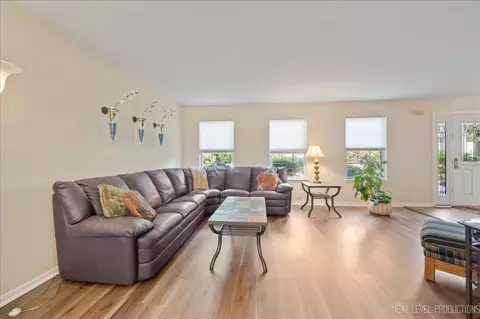 Living - 1439 Huntcliff Rd, Bartlett, IL 60103 photo 1 of 2