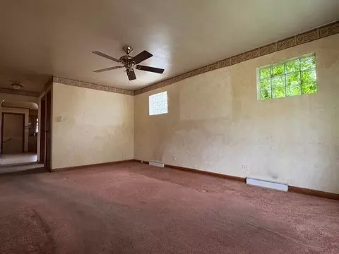 Living - 323 E 87th St, Chicago, IL 60619 photo 2 of 2