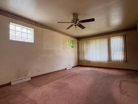 Living - 323 E 87th St, Chicago, IL 60619 photo 1 of 2