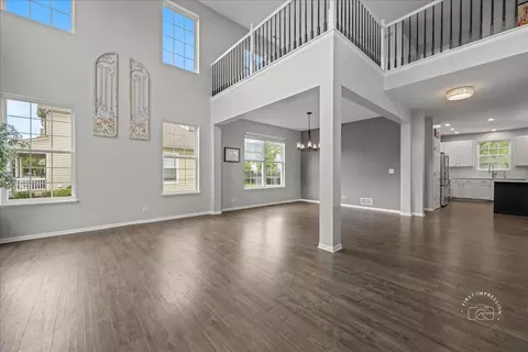 Living - 300 Monument Rd, Elgin, IL 60124 photo 1 of 7