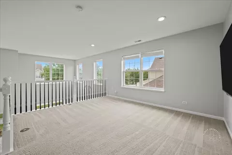 Living - 300 Monument Rd, Elgin, IL 60124 photo 6 of 7