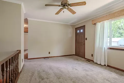 Living - 1307 Pinehurst Dr, Bloomington, IL 61704 photo 4 of 4