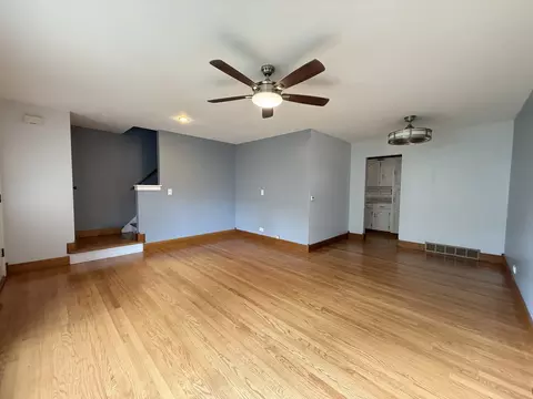 Living - 702 E Shabonee Trl, Mount Prospect, IL 60056 photo 1 of 3