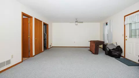 Living - 2717 Arrowhead Dr, Bloomington, IL 61704 photo 9 of 12