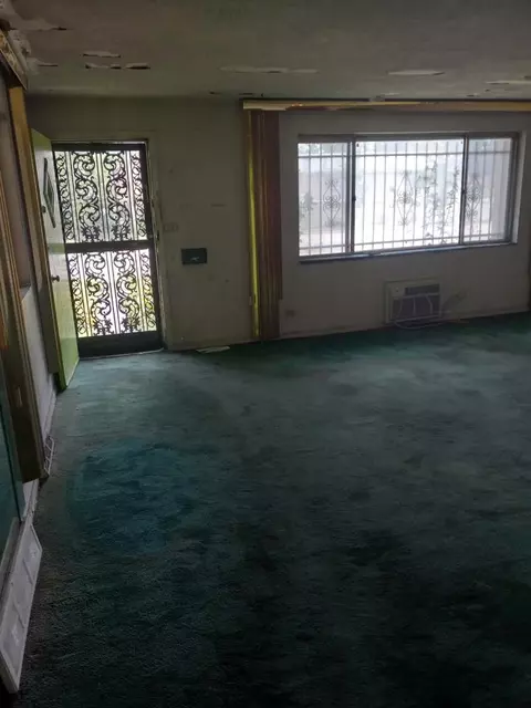 Living - 9556 S Colfax Ave, Chicago, IL 60617 photo 1 of 2