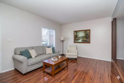 Living - 11 Cypress Sq, Elgin, IL 60123 photo 1 of 3