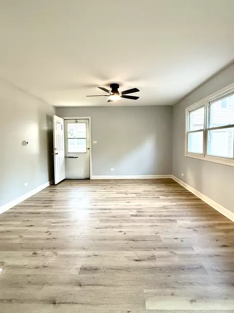 Living - 121 Lucille Ct #A, Bartlett, IL 60103 photo 1 of 1