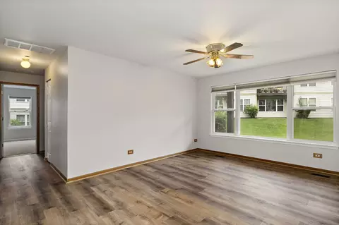 Living - 1104 Yorkshire Ct #A, Elgin, IL 60120 photo 1 of 4
