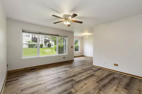 Living - 1104 Yorkshire Ct #A, Elgin, IL 60120 photo 2 of 4