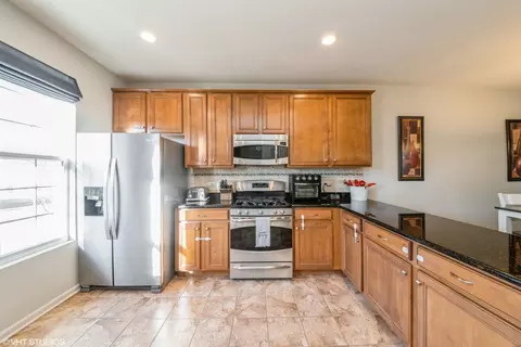 Kitchen - 4076 Pompton Ave, Elgin, IL 60124 photo 2 of 3