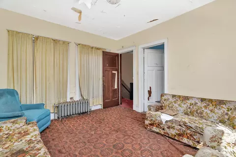 Living - 224 E Cass St, Joliet, IL 60432 photo 1 of 1