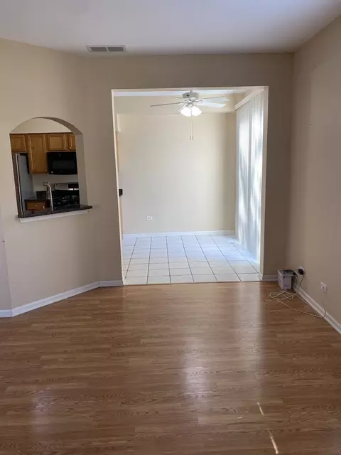 Living - 1091 Delta Dr, Elgin, IL 60123 photo 6 of 7