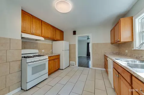 Kitchen - 215 E Pine Ave, Bensenville, IL 60106 photo 2 of 3
