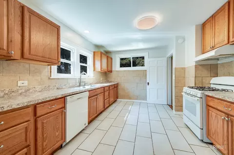Kitchen - 215 E Pine Ave, Bensenville, IL 60106 photo 3 of 3