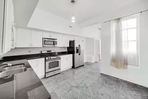 Kitchen - 4743 S Champlain Ave, Chicago, IL 60615 photo 1 of 3
