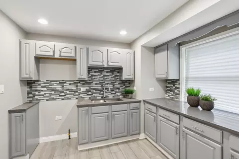Kitchen - 2129 E 97th St, Chicago, IL 60617 photo 1 of 2