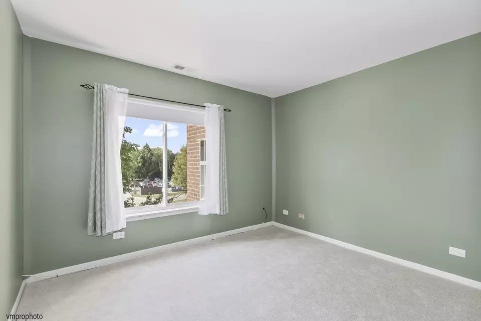 Bedroom - 945 E Kenilworth Ave #318, Palatine, IL 60074 photo 2 of 3