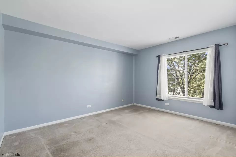 Bedroom - 945 E Kenilworth Ave #318, Palatine, IL 60074 photo 3 of 3