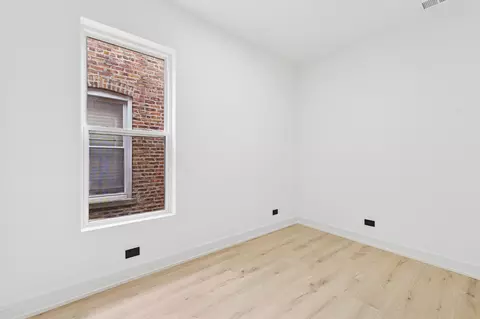 Bedroom - 6430 S Eberhart Ave, Chicago, IL 60637 photo 6 of 10