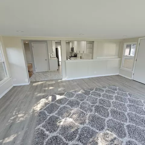 Living - 1291 Phoenix Dr, Des Plaines, IL 60018 photo 2 of 2