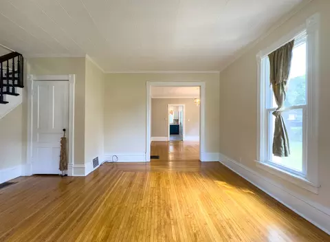 Living - 909 Bellevue Ave, Elgin, IL 60120 photo 2 of 7