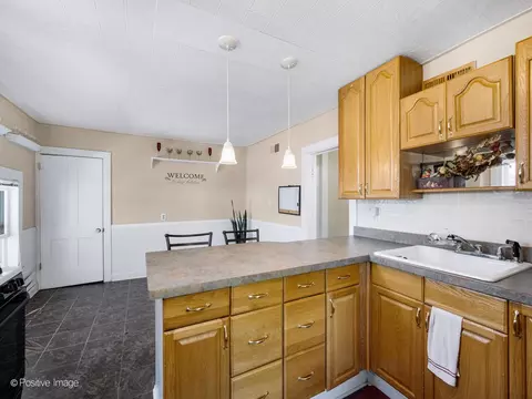 Kitchen - 211 Cedar St, Aurora, IL 60506 photo 2 of 4