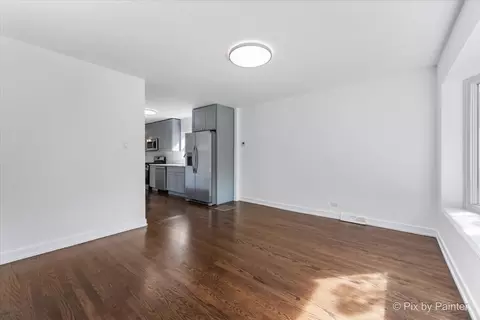 Living - 9023 S Dobson Ave, Chicago, IL 60619 photo 2 of 2
