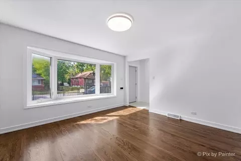 Living - 9023 S Dobson Ave, Chicago, IL 60619 photo 1 of 2