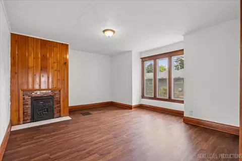 Living - 321 E Main St E, Plano, IL 60545 photo 2 of 3