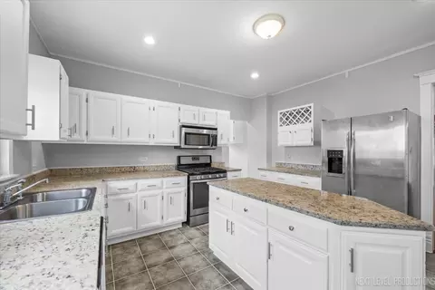 Kitchen - 321 E Main St E, Plano, IL 60545 photo 3 of 3