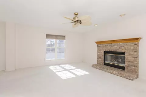 Living - 1015 Sawgrass Dr, Normal, IL 61761 photo 13 of 14
