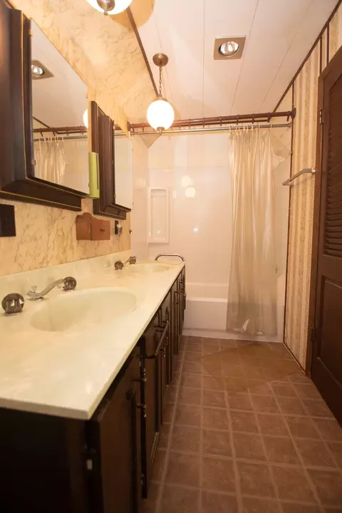 Bath - 210 E Front St, Mount Morris, IL 61054 photo 1 of 2