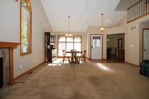 Living - 1414 Tamarack Cc Trl # B, Normal, IL 61761 photo 6 of 9