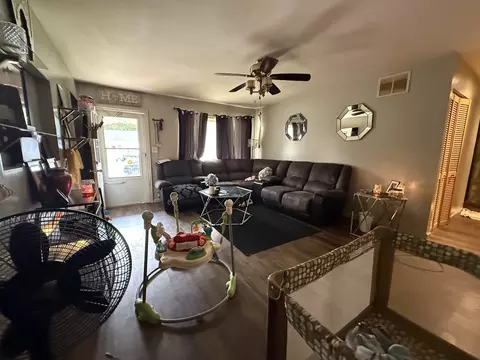 Living - 1021 Briarcliff Dr, Rantoul, IL 61866 photo 2 of 3
