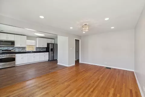 Living - 14455 Des Plaines St, Harvey, IL 60426 photo 3 of 4