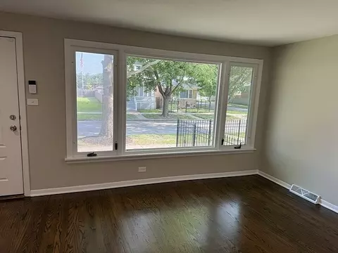 Living - 653 E 87th Pl, Chicago, IL 60619 photo 1 of 3